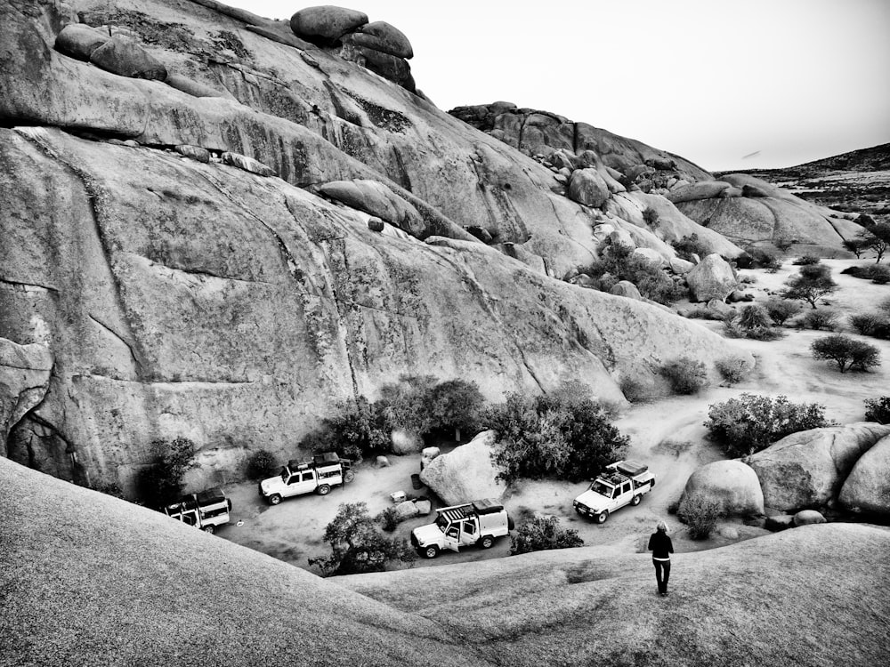 grayscale photo of cars on road