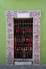 red and white floral window in mexico