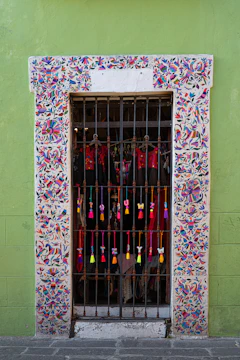 red and white floral window in mexico