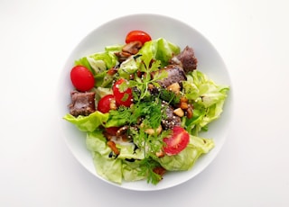 vegetable salad on white ceramic plate