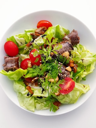 vegetable salad on white ceramic plate