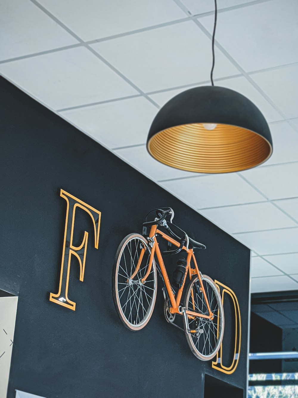 yellow city bike on white floor tiles