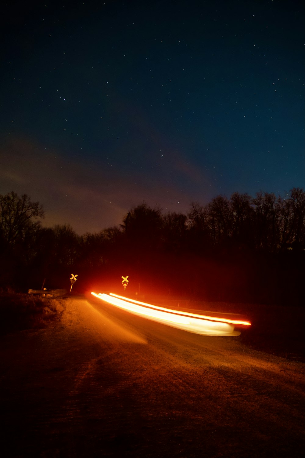 lighted boat on sea during night time