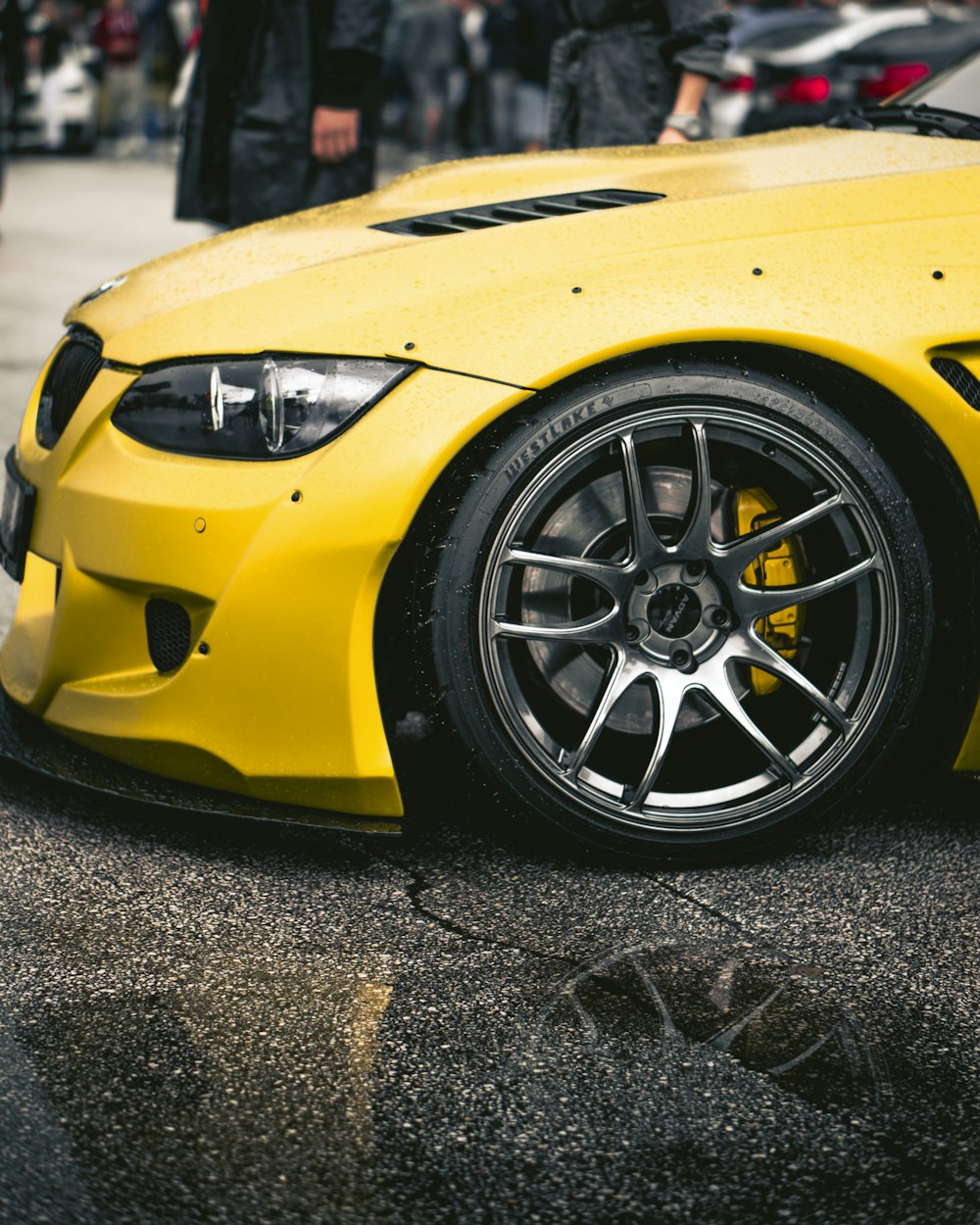 yellow lamborghini aventador on road during daytime