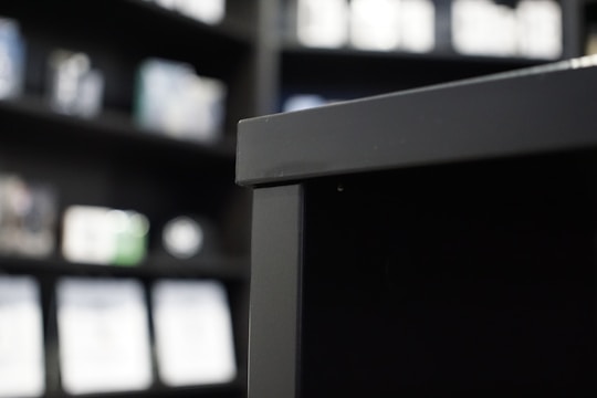 Close-up of a finely crafted MDF shelf with intricate detailing and glossy finish.