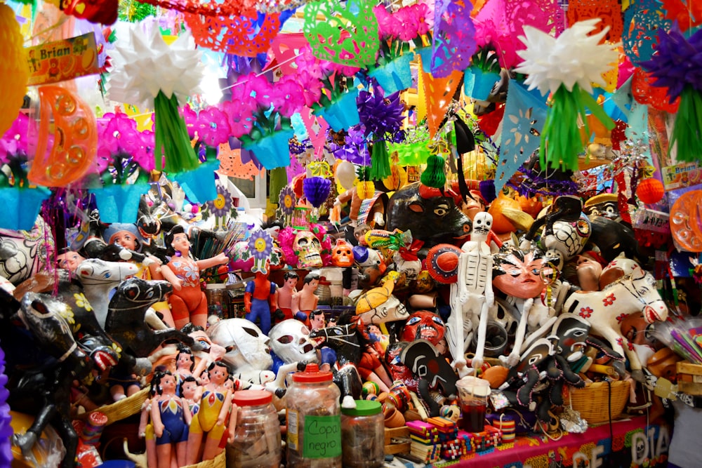 assorted plastic toys on brown wooden table