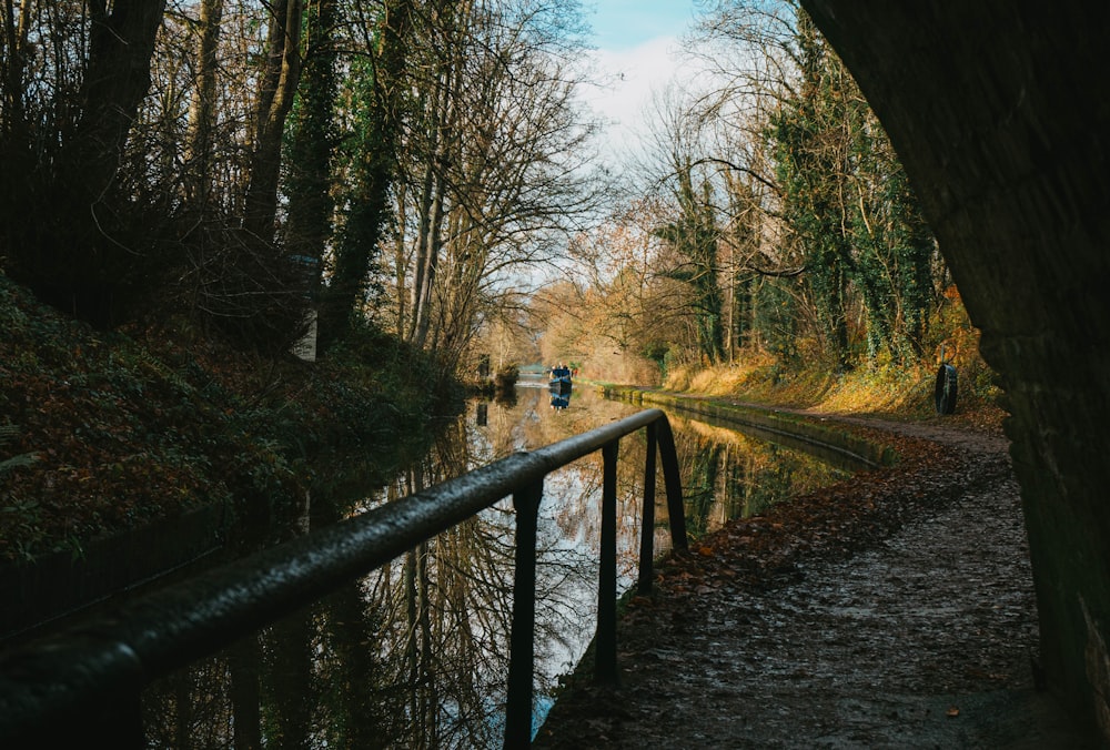 brown wooden bridge over river