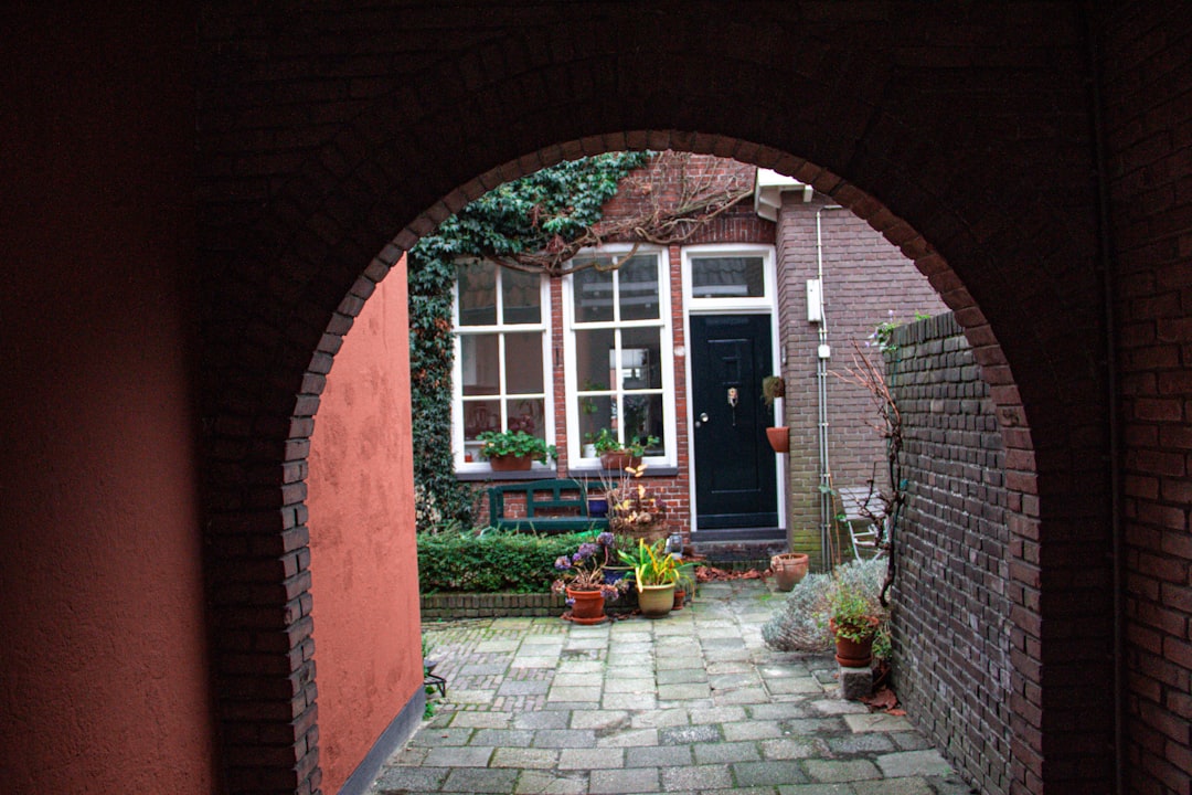 red brick house with white wooden door