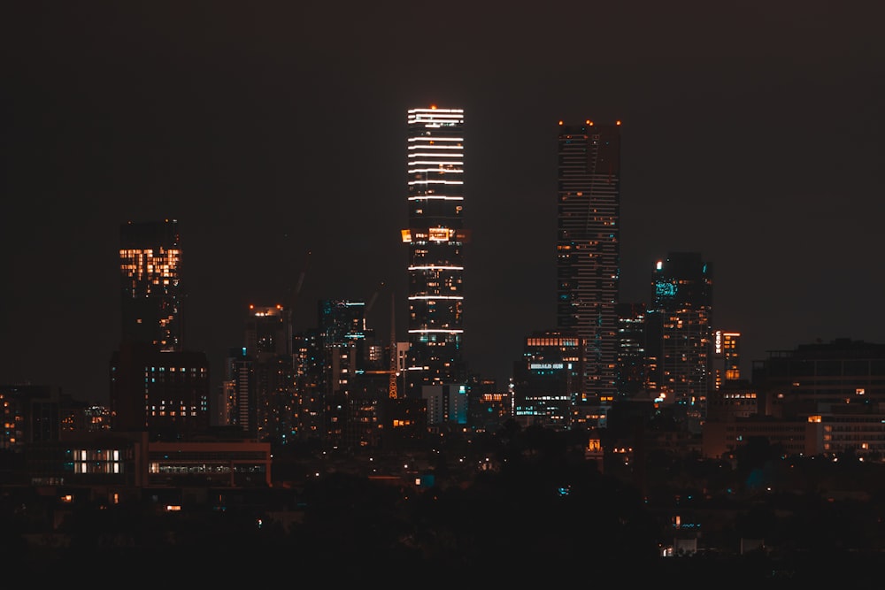 city skyline during night time