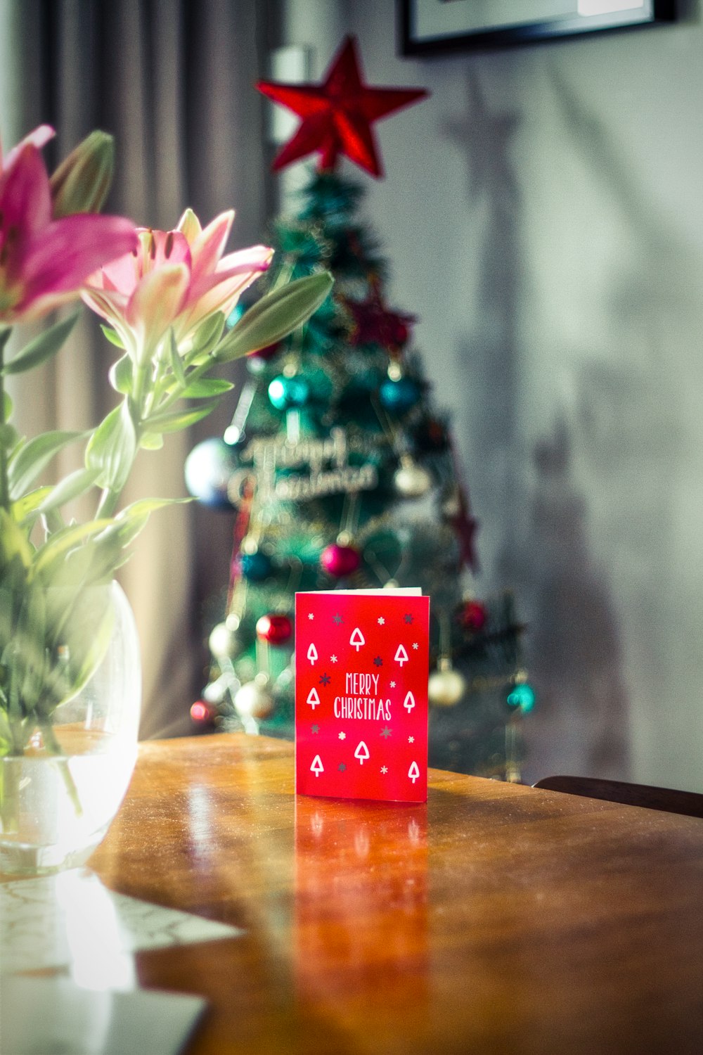 red and white card on brown wooden table