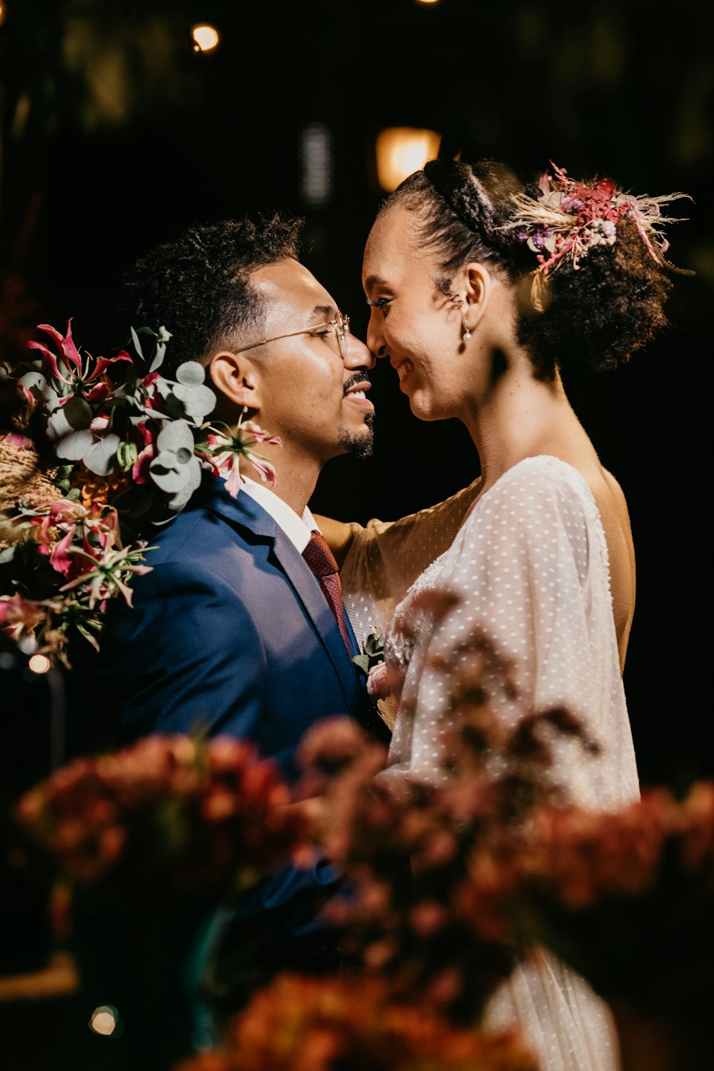 a man and a woman standing next to each other