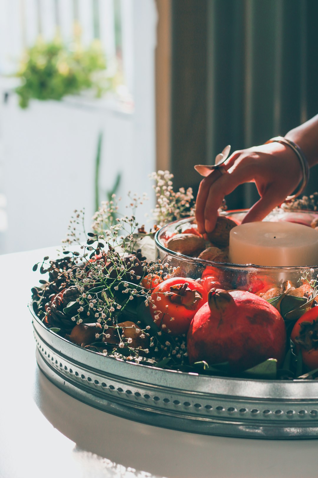 red fruit on white ceramic bowl