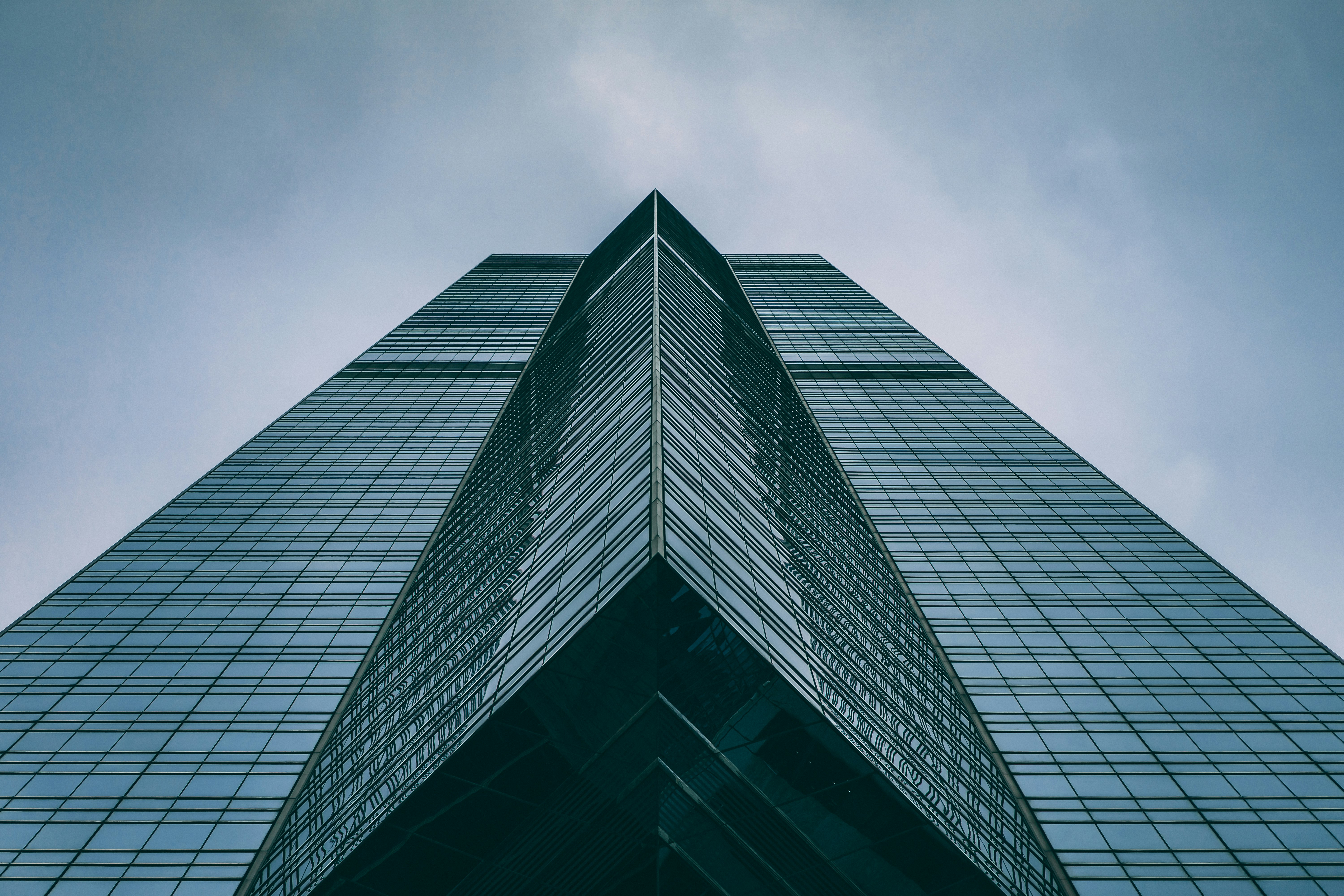 black concrete building under white sky during daytime