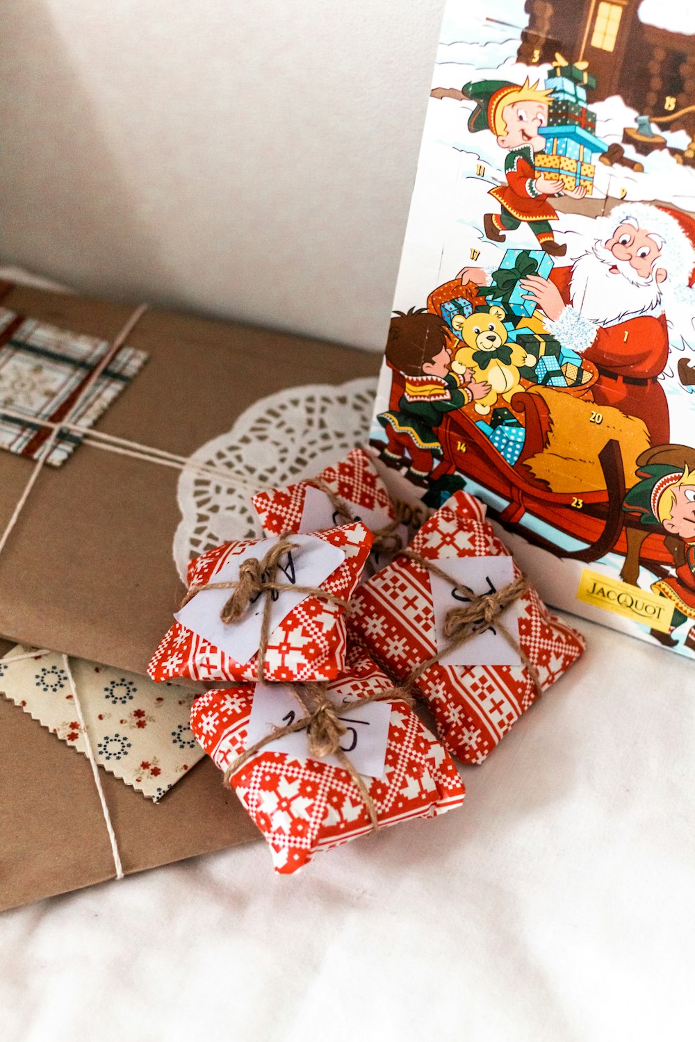 red and white santa claus print gift bag