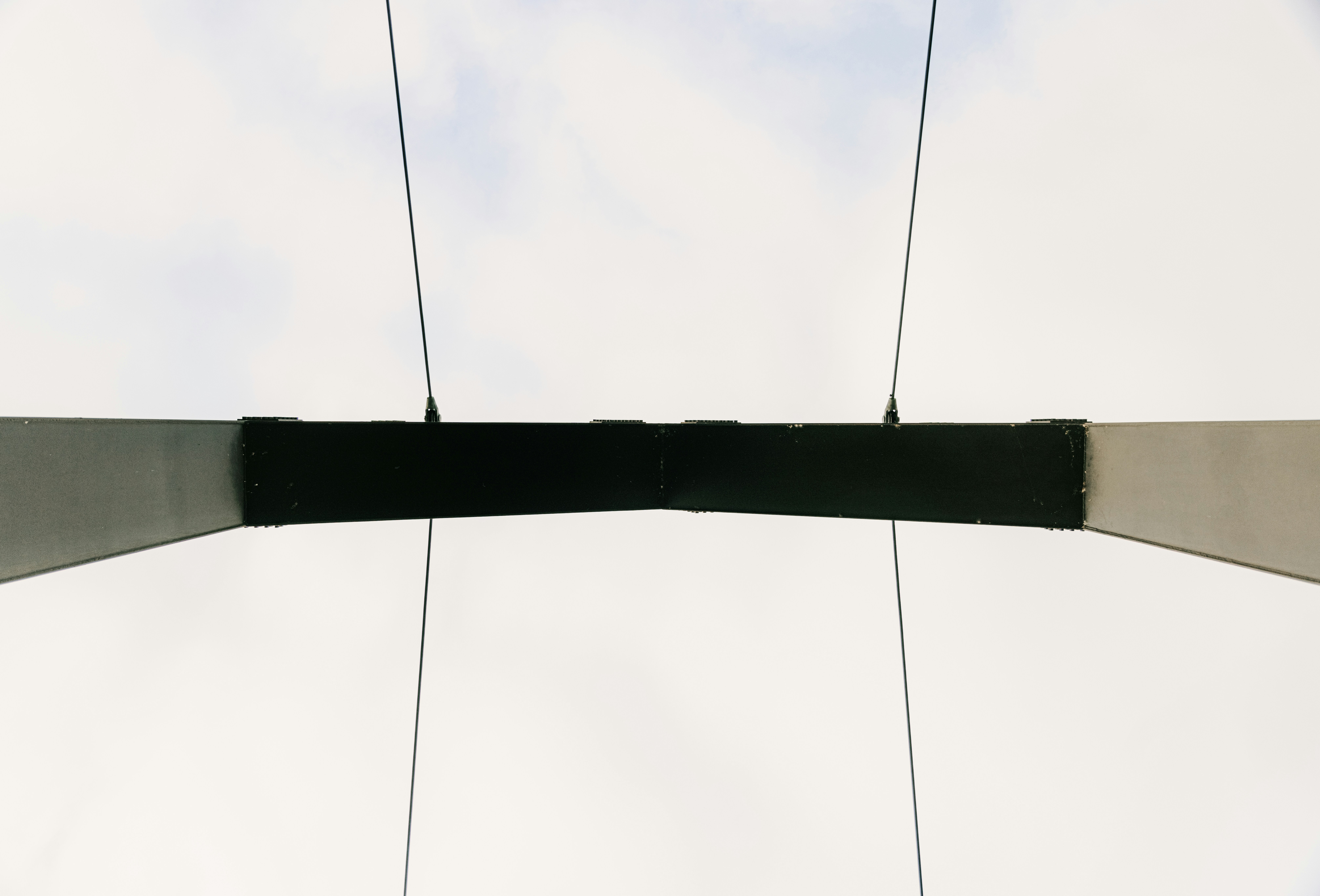 black electric wires under white clouds