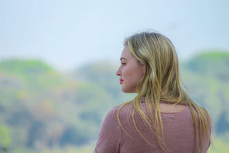 woman in brown long sleeve shirt