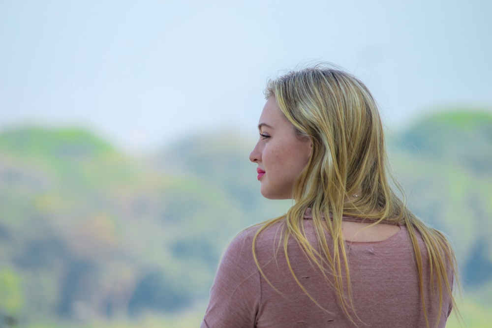 woman in brown long sleeve shirt