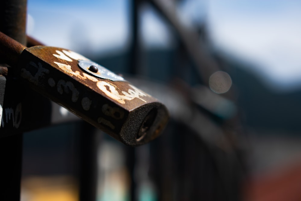 brown and black metal padlock