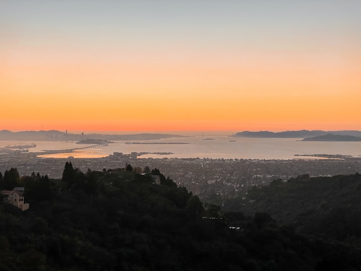 A scenic view of Batam's coastline at sunset.