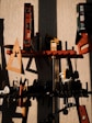 assorted color power tools on wall