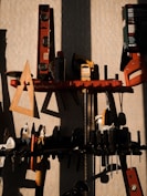assorted color power tools on wall