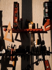 assorted color power tools on wall