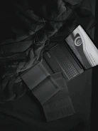 Study materials and a laptop screen showing DELF exam preparation content.