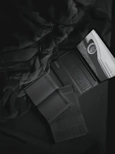 Study materials and a laptop screen showing DELF exam preparation content.
