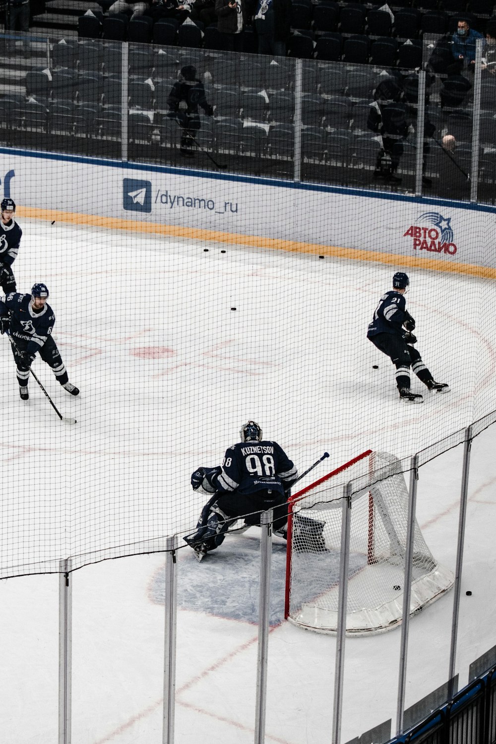 ice hockey players on ice hockey field