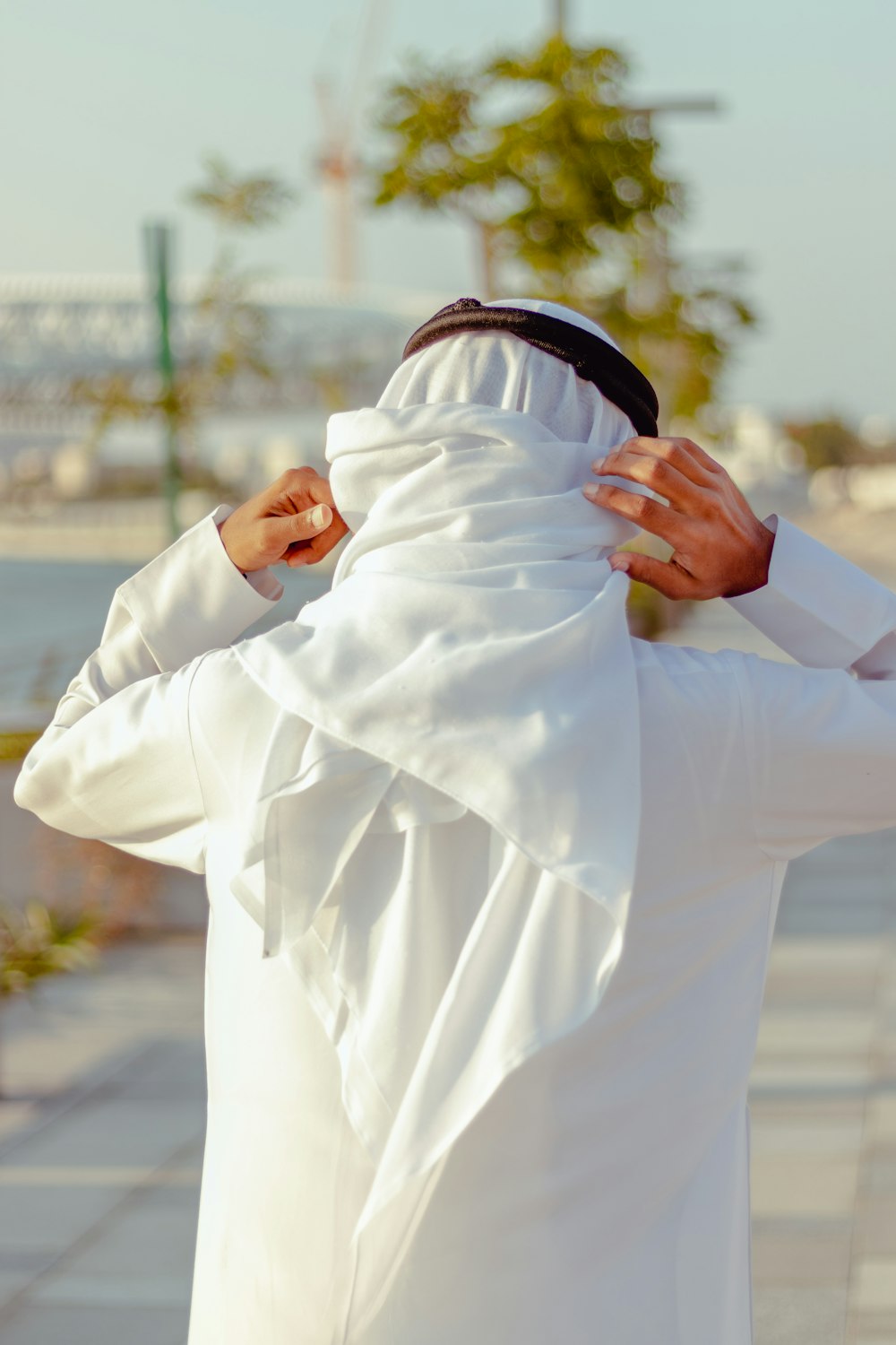 woman in white long sleeve shirt