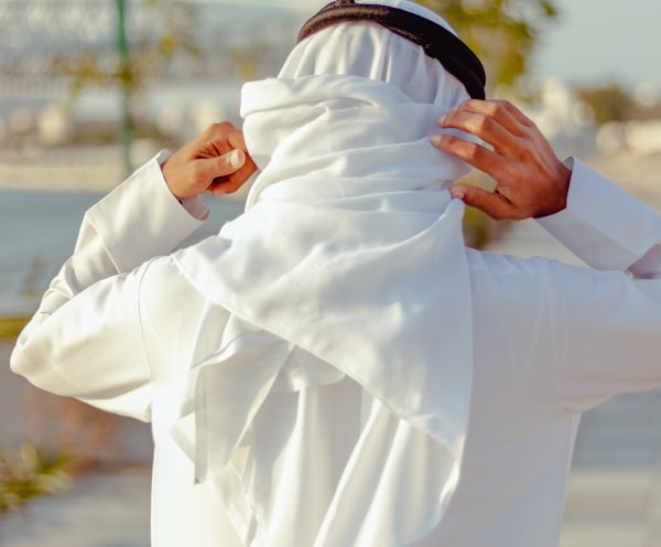 woman in white long sleeve shirt