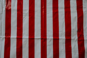red and white striped textile