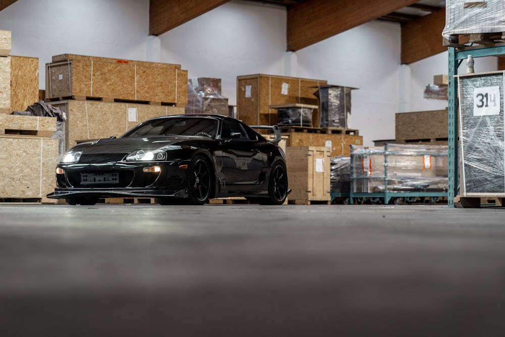 black bmw m 3 coupe in garage