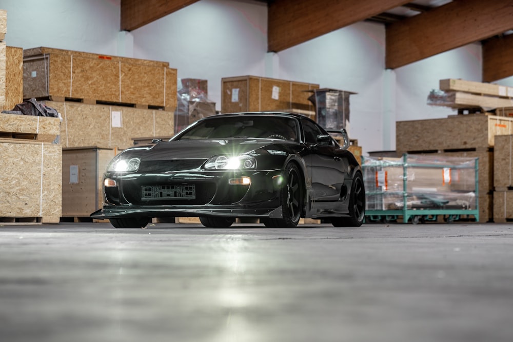 black bmw m 3 coupe in garage