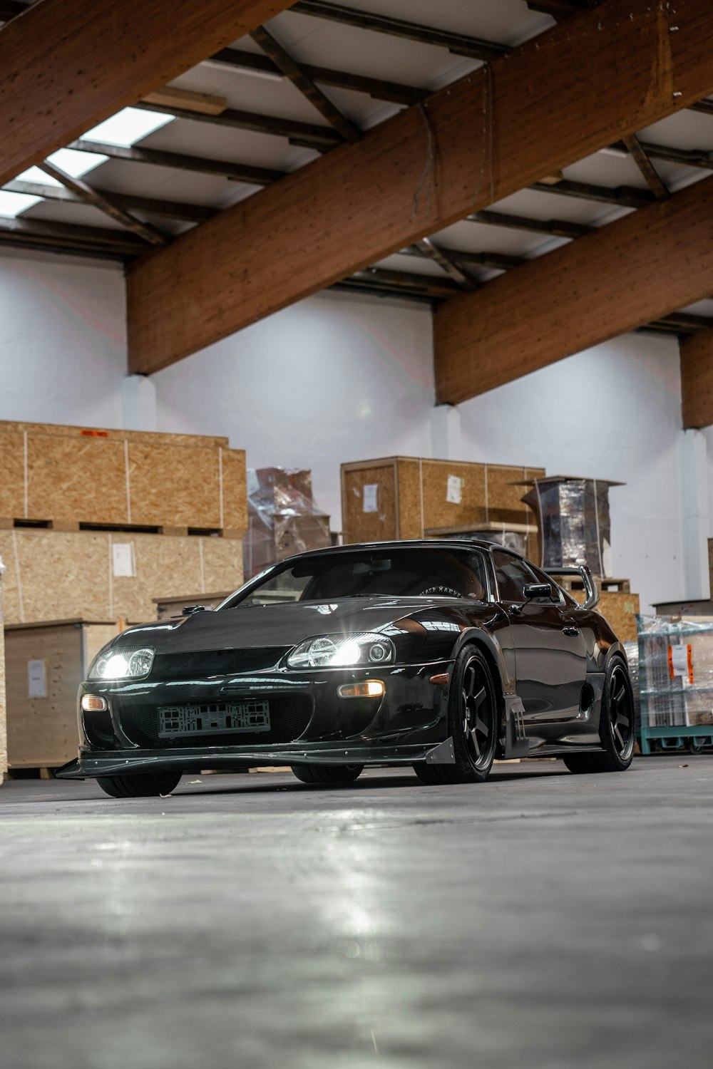 black bmw m 3 coupe parked in garage