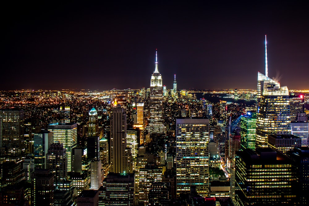 city with high rise buildings during night time