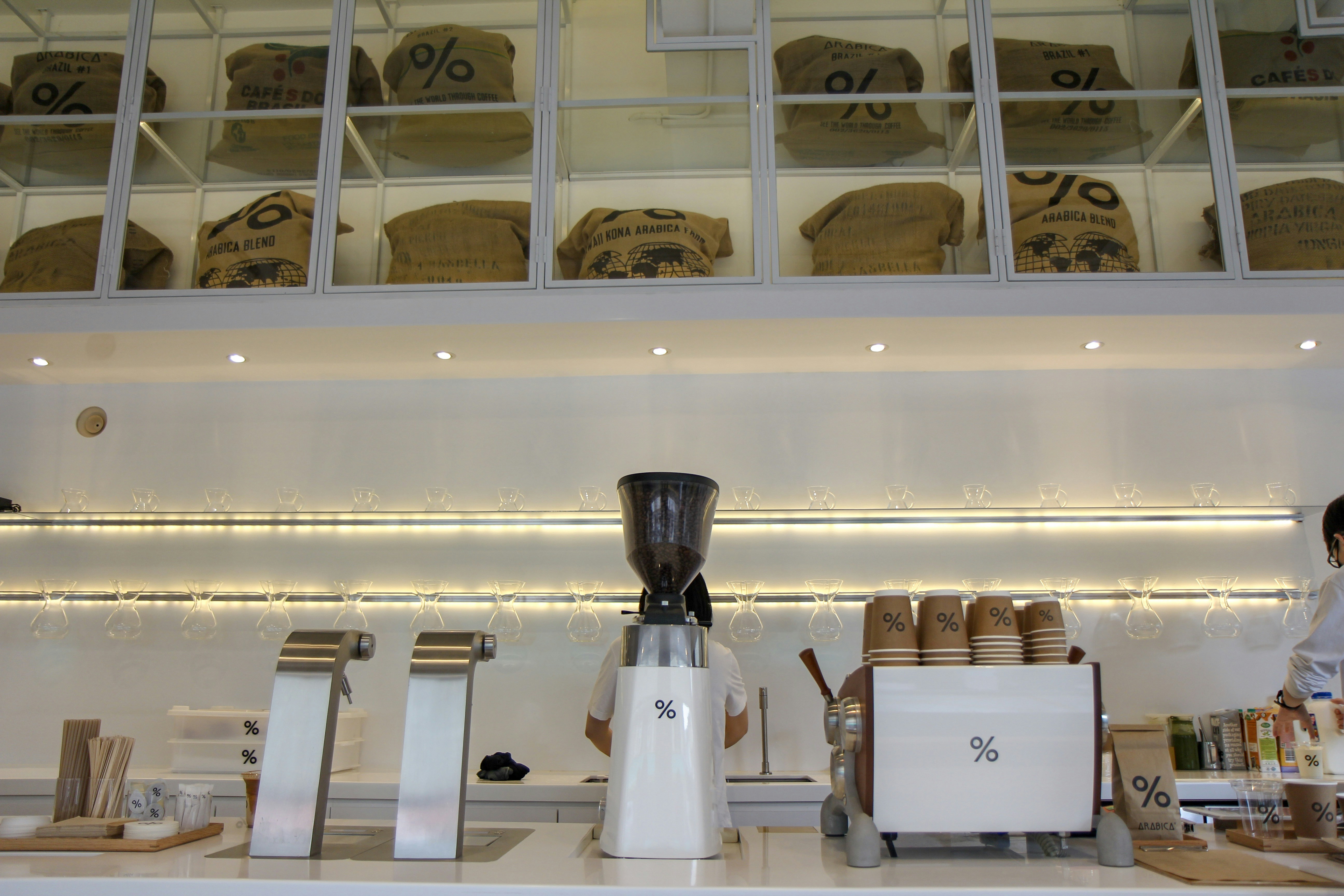 stainless steel and clear glass condiment shakers