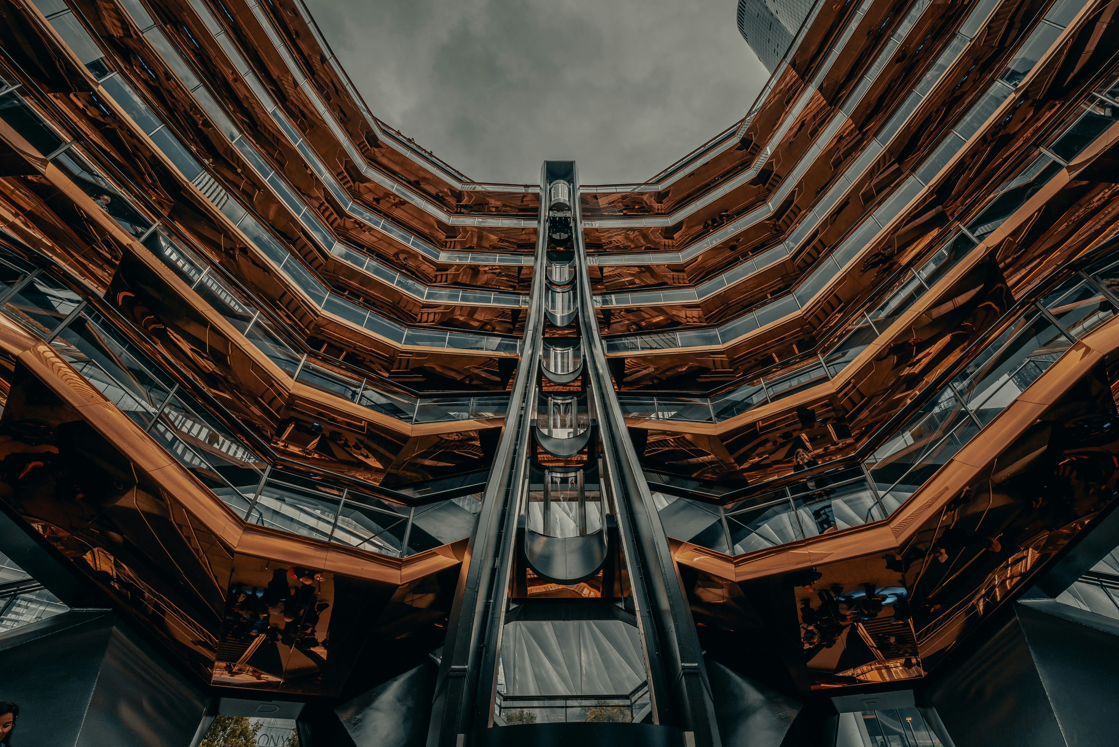 low angle photography of brown and gray concrete building