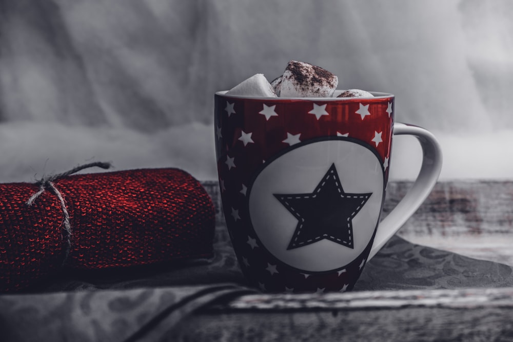 white and red star print ceramic mug