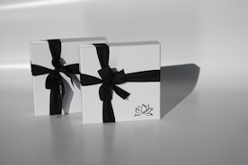 black and white gift box with ribbon