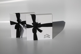 black and white gift box with ribbon