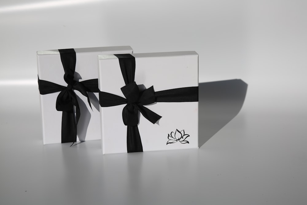 black and white gift box with ribbon