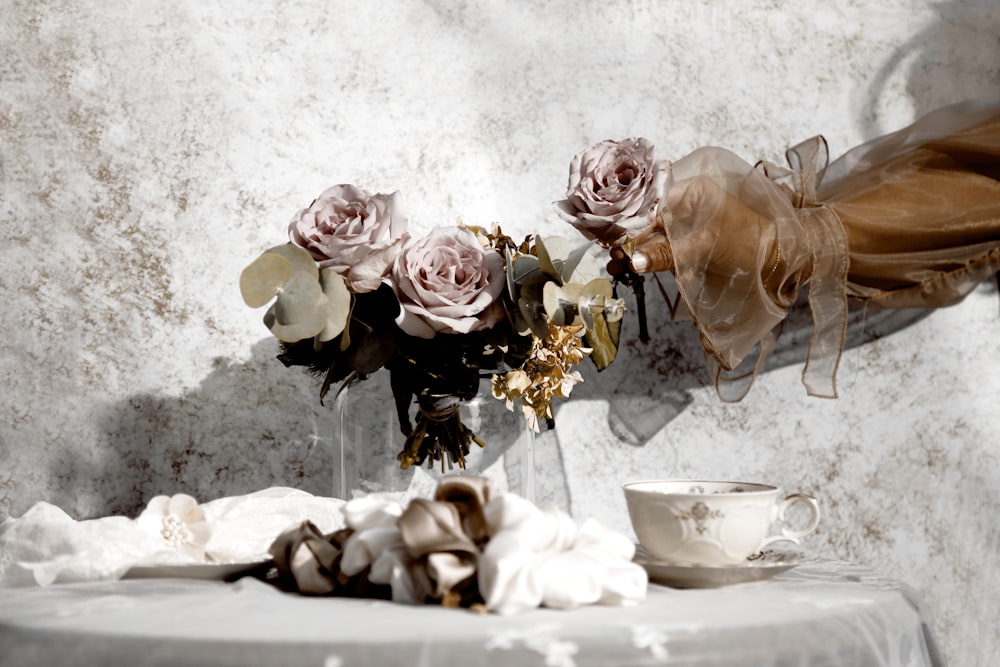 pink roses on white table