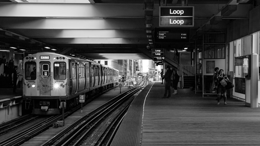 grayscale photo of train station