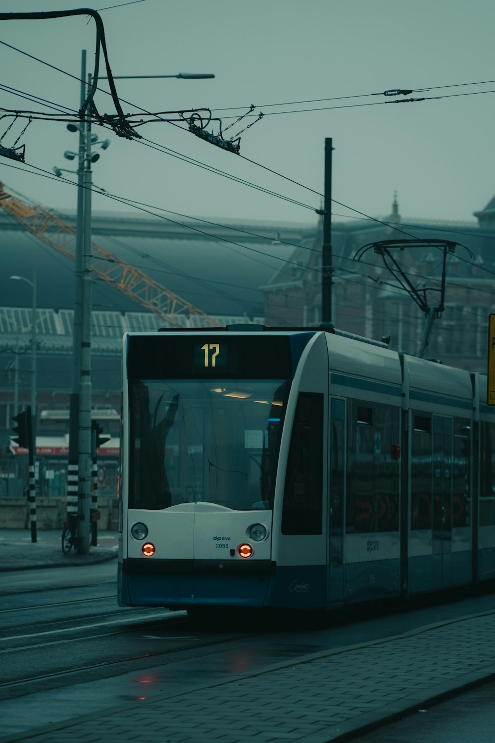 white and black train on rail road during daytime