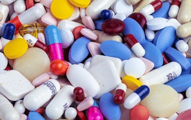 white blue and orange medication pill