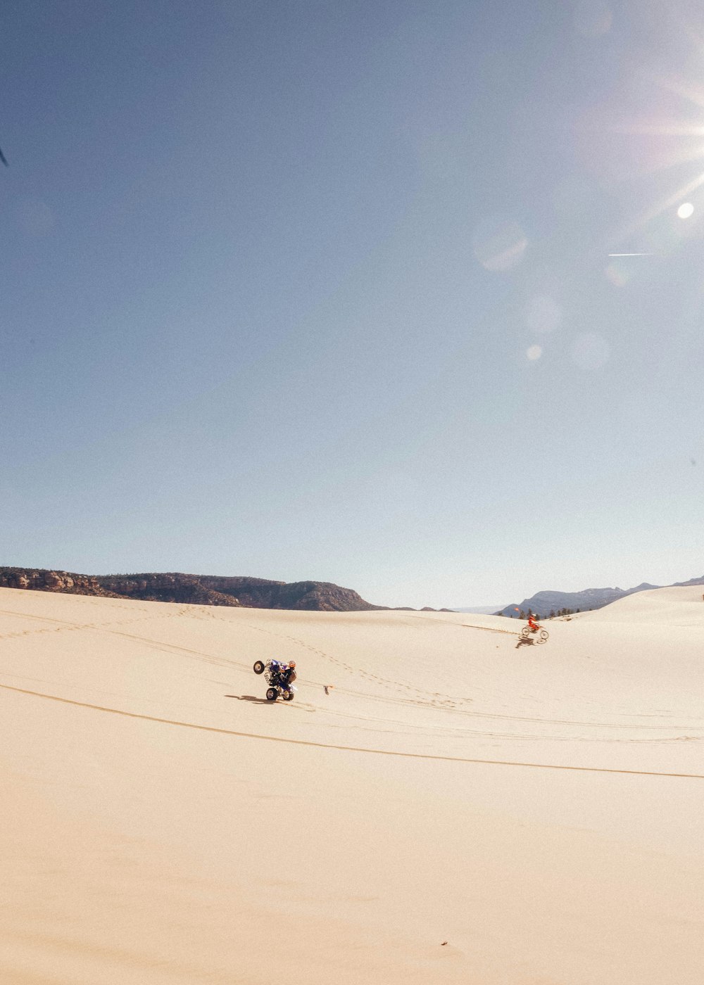 people walking on white sand during daytime