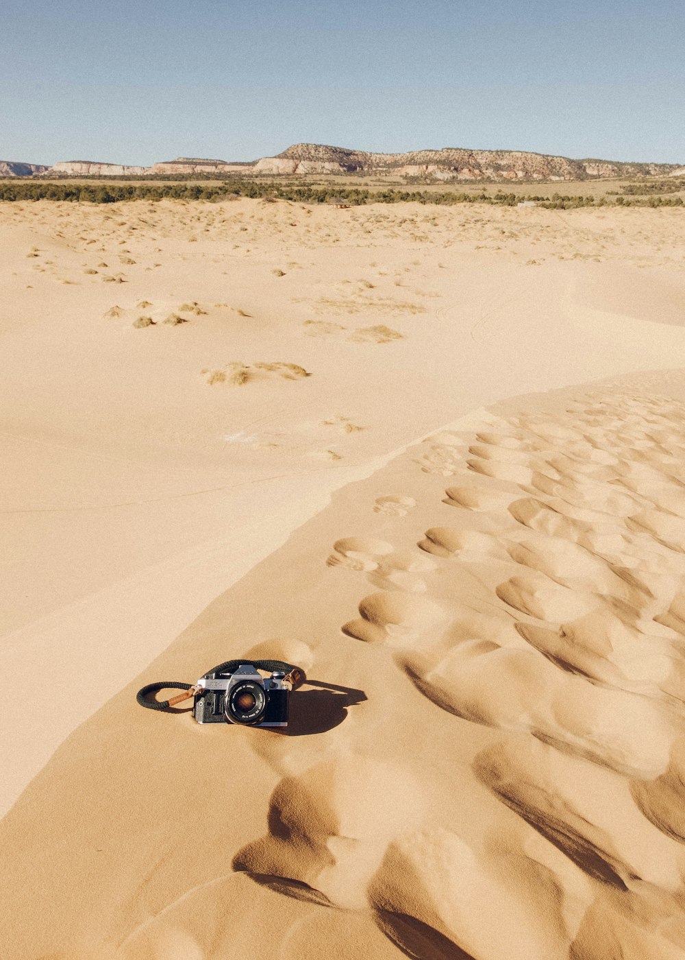 black car on desert during daytime