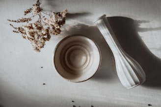 An artistic composition of everyday objects in natural light.