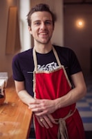 man in black crew neck t-shirt smiling